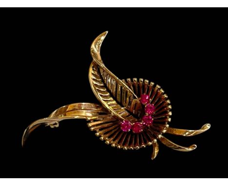 9 carat yellow gold leaf design brooch set with five rubies.