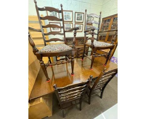 Priory oak buffet sideboard, rectangular dining table and six ladder back dining chairs including pair carvers (8).