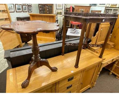 Mahogany Chippendale style silver table and mahogany shaped top tripod occasional table.