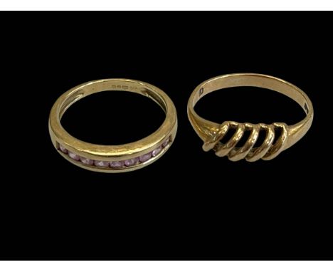 Two 9 carat gold rings.