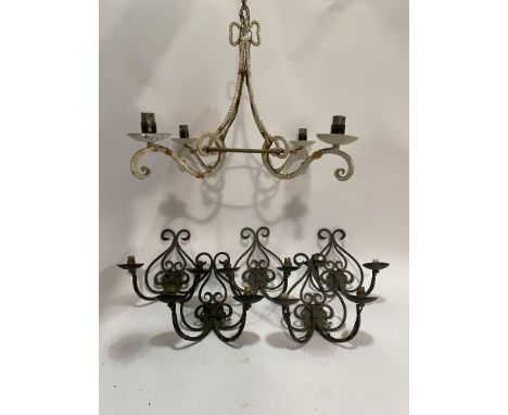A set of five wrought iron twin branch wall sconces of scrolling form with verdigris finish, early to mid 20th century, toget