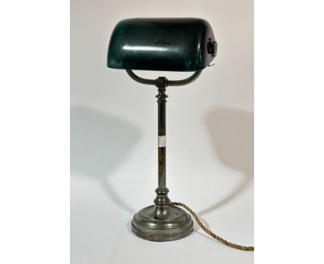 An Art Deco brass metal and green glass banker desk lamp, with switch to base. (h-47.5cm)