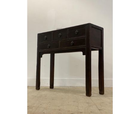 A Chinese stained hardwood sideboard, late 20th century, the panelled top over three short and two long drawers, raised on sq