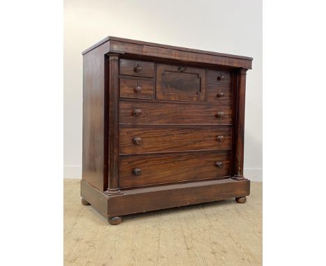 A mid 19th century Scottish mahogany chest, fitted with a millinery drawer flanked by four short and over three long graduate
