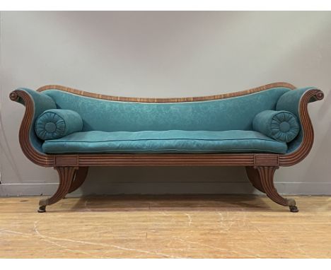 A Regency mahogany scroll arm sofa, circa 1820, the undulating back, arms, squab and bolster cushions well upholstered in gre