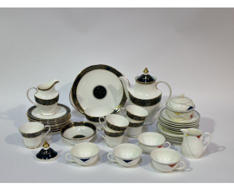 A Royal Doulton Carlyle pattern part tea service comprising, one serving dish (w-26cm), one milk jug (h-15cm), four tea cups 