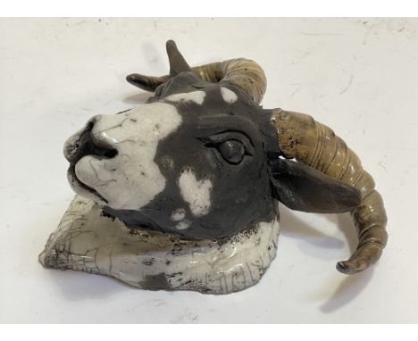 A Studio pottery ceramic rams head wall mask W21cm.