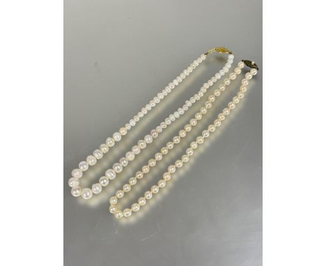 A cultured pearl necklace with silver clasp fastening&nbsp; L x 20cm and a Chinese freshwater pearl graduated baroque necklac