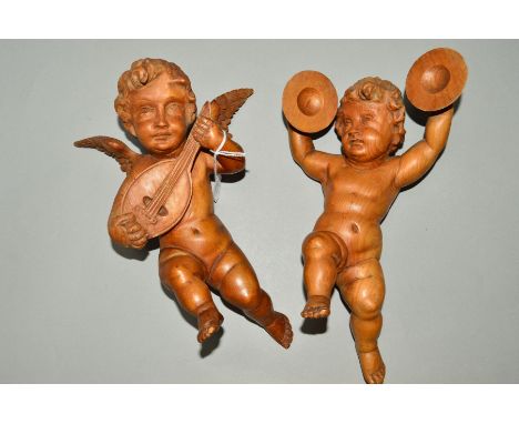 TWO LATE 19TH CENTURY CARVED WOOD MUSICIAN ANGELS, one with mandolin, the other with cymbals (lacking wings), height 28.5cm, 