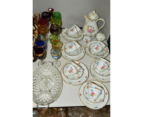 HUTSCHENREUTHER DRESDEN TEAWARES, hot water jug, milk jug, covered sugar bowl, twelve cups, twelve saucers and eleven side pl