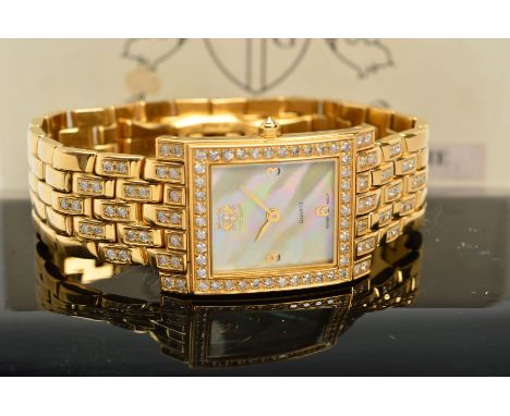 ASTON GERARD GOLD PLATED QUARTZ WRISTWATCH, rectangular diamond case, lugs and beginning of bracelet, mother of pearl dial, y