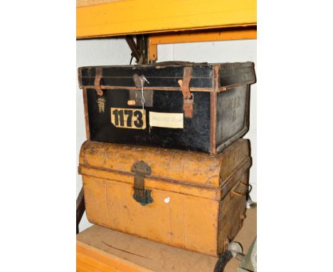 A VINTAGE TIN TRUNK together with a leather bound trunk with labels (2)
