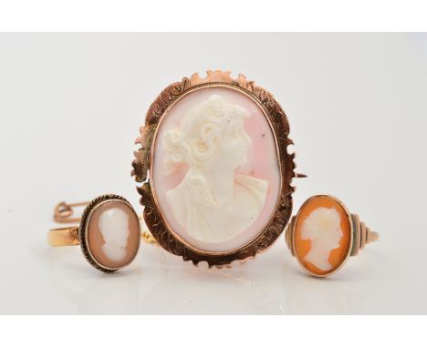 A CAMEO BROOCH AND TWO CAMEO RINGS, the brooch with an oval cameo carved to depict a lady in profile within a shaped surround