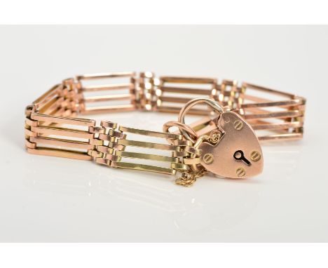 A GATE BRACELET WITH HEART PADLOCK CLASP, the padlock clasp stamped 9ct, with safety chain attached, length of bracelet 190mm