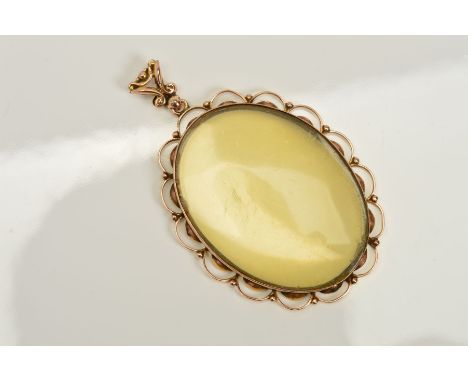 A LATE 19TH CENTURY TO EARLY 20TH CENTURY PICTURE PORTRAIT PENDANT, scalloped edge, measuring approximately 47mm x 35mm, stam