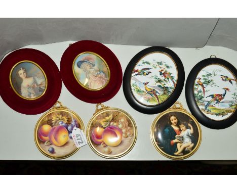 A PAIR OF SEVERN WARE CHINA FRAMED CIRCULAR PLAQUES, fruit decorated and signed N. Creed, overall diameter approximately 10cm
