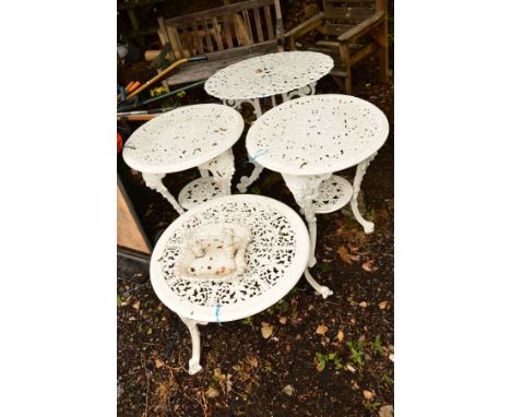 A PAIR OF CIRCULAR WHITE PAINTED ALUMINIUM GARDEN TABLES on triple legs united by an under shelf, together with another circu