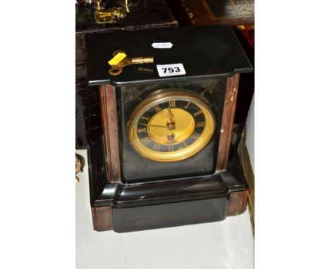A LATE VICTORIAN BLACK SLATE MANTEL CLOCK, veined red marble details, gilt dial with Roman numerals, 30 hour movement with pe