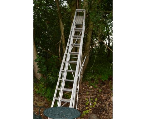 A TALL ALUMINIUM STEP LADDER, height 370cm together with a three metre double extension ladder (2)