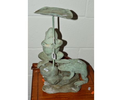 A BRONZE GARDEN FEATURE OF TWO TOADS below a lily pad