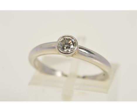 A MODERN PLATINUM SINGLE STONE DIAMOND RING ,estimated modern round brilliant cut weight 0.25ct, colour assessed as G-H, clar