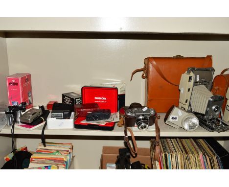 A COLLECTION OF CAMERAS AND OPTICAL EQUIPMENT, including a Minox GT-E , in hard case with leather case and flash, two Polaroi
