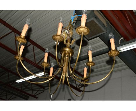 A LARGE BRASS NINE BRANCH CHANDELIER, together with an Art Deco style five branch ceiling light and four various glazed ceili
