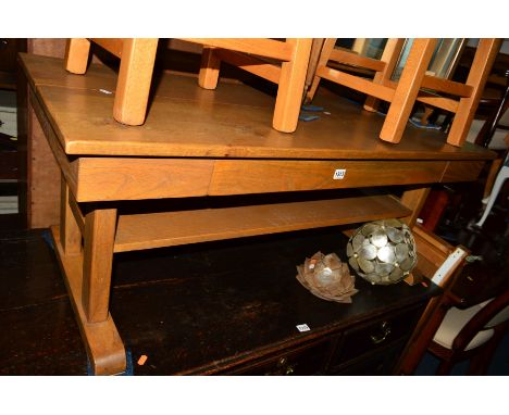A WILLIS AND GAMBIER LIGHT OAK COFFEE TABLE with a single long drawer, width 120cm x depth 55.5cm x height 48cm