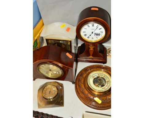 AN EDWARDIAN MAHOGANY AND INLAID BALLOON SHAPED  MANTEL CLOCK, enamel dial with Roman numerals, named J.H.Potter, Sheffield, 