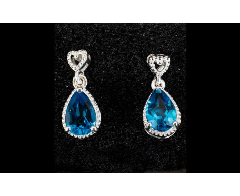 Swiss Blue Topaz Pendant Earrings, pear cut Swiss Blue topaz solitaires, totalling 2.5cts, set in silver milgrain frames, sus