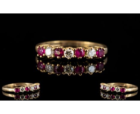 Ladies 9ct Gold - Six Stone Ruby &amp; Diamond Dress Ring. The rubies and diamonds of pleasing colour.  Fully hallmarked for 