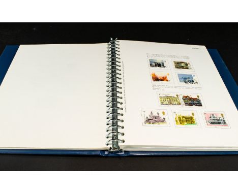 Stamp Interest Blue A4 Multi Ring Stamp Album with largely complete set of GB stamps from 1971 to 1985. See photo.