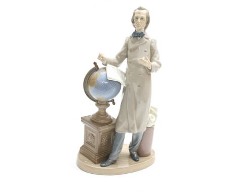 Lladro - large figural group of a scholar reading from his papers standing by a globe, further charts and papers by his feet 