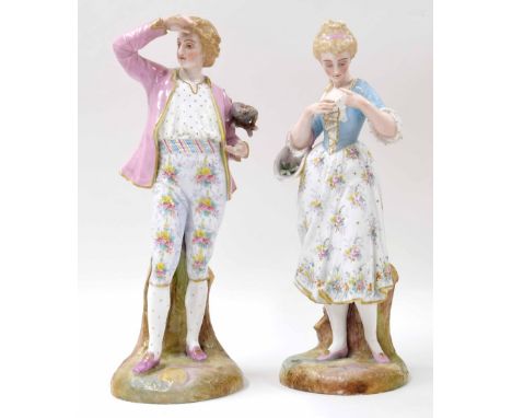 Pair of late 19th century German porcelain figures in the manner of Meissen, modelled as a gentleman and lady upon naturalist