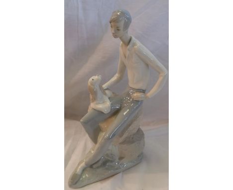 Nao figure of a boy and his dog. P&amp;P Group 2 (£18+VAT for the first lot and £3+VAT for subsequent lots) 