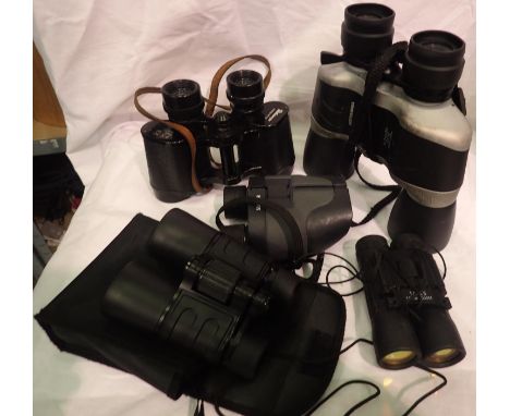 Four pairs of binoculars including a Pathescope example. P&amp;P Group 2 (£18+VAT for the first lot and £3+VAT for subsequent