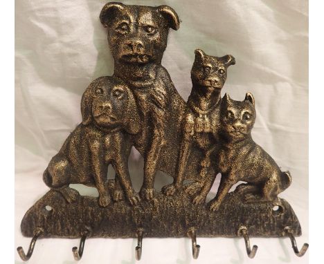 Bronzed dog tail coat hook. P&amp;P Group 1 (£14+VAT for the first lot and £1+VAT for subsequent lots) 