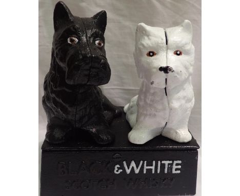 Cast iron black and white dogs. P&amp;P Group 1 (£14+VAT for the first lot and £1+VAT for subsequent lots) 