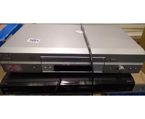 Two DVD players. All electrical items in this lot have been PAT tested for safety and have passed. This does not confirm that