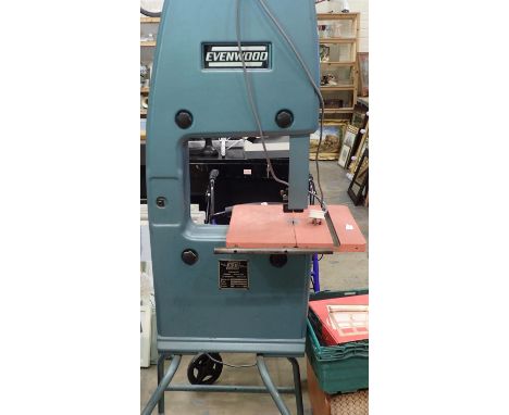 Evenwood floor standing band saw. All electrical items in this lot have been PAT tested for safety and have passed. This does