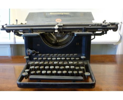 An early 20thC Remington manual typewriter with a 21'' carriage