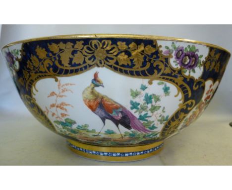 A late 18th/early 19thC, possibly Royal Worcester, porcelain footed bowl, decorated with gilded scale ornament, vignette stud