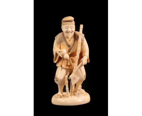 A Japanese Ivory Okimono as a Woodsman, Meiji period, standing holding a gourd and an axe, bamboo stems at his side, on a sha
