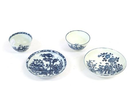 A Worcester Porcelain Tea Bowl and Saucer, circa 1775, printed in underglaze blue with the Three Ladies pattern crescent mark