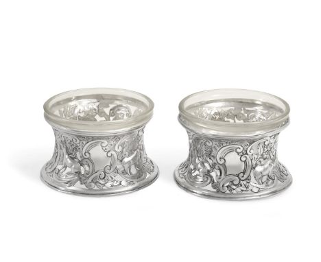 A Pair of Victorian Silver Salt-Cellars, by Nathan and Hayes, Chester, 1898, each in the form of an Irish dish-ring, spool sh