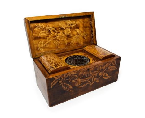 A Regency Mahogany and Pokerwork Tea Caddy, circa 1820, of rectangular form, containing two domed canisters and a mixing bowl