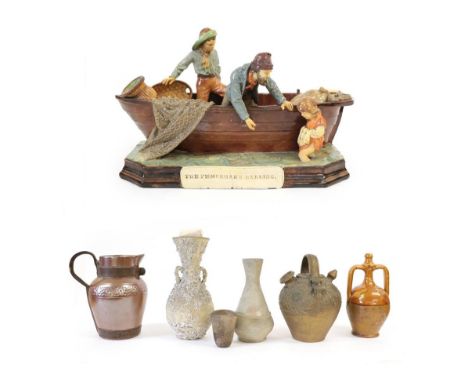 An Earthenware Group of THE FISHERMAN'S DARLING, late 19th century, possibly Wayte &amp; Ridge, modelled as two fishermen in 