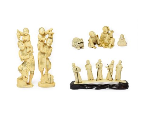 A Japanese Ivory Okimono as Two Children, Meiji period, 8cm wide; Four Similar Okimonos; A Group of Figures on a Bridge; A Ch