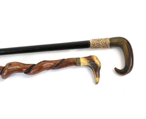 A Horn and Ebonised Walking Stick, late 19th century, the foliate collar stamped 18ct and inscribed W Abbey DEWSBURY, 92cm hi