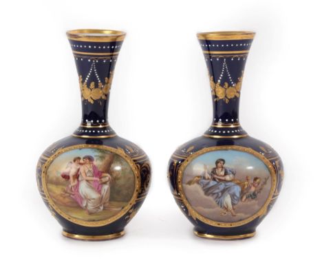 A Pair of Vienna Style Porcelain Bottle Vases, late 19th century, painted with ''Venus'' and ''Saffo'' in panels on a blue gr